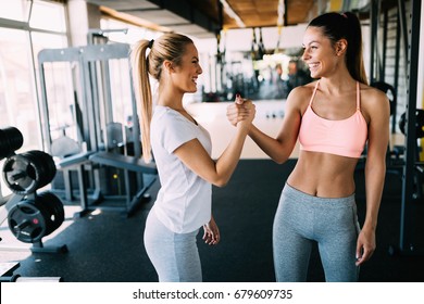 Picture of two fitness women in gym