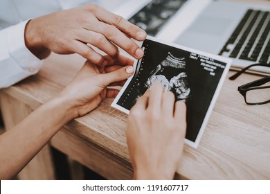 Picture. Ultrasound. Pregnant Girl. Motherhood. Doctor Show. Consultation. Gynecology. Hospital. Doctor. Clinic. Gynecologist. Medical Advice. Woman. White Coat. Have Fun. Childbirth. Belly. Fan. - Powered by Shutterstock