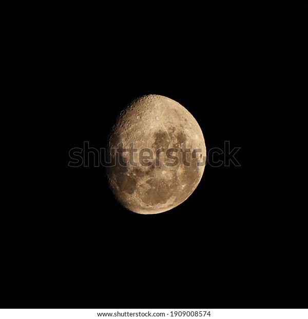 A picture of a waning gibbous of the moon after the\
full moon