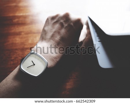 Similar – Image, Stock Photo Woman calling on phone wearing blue dress and silver wristwatch