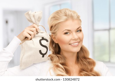 picture of woman with dollar signed bag - Powered by Shutterstock