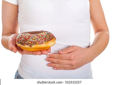 Picture Of A Woman Having Indigestion From Too Much Doughnuts