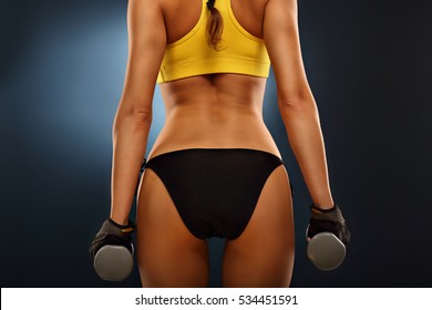 Picture Of Woman Lifting Dumbells