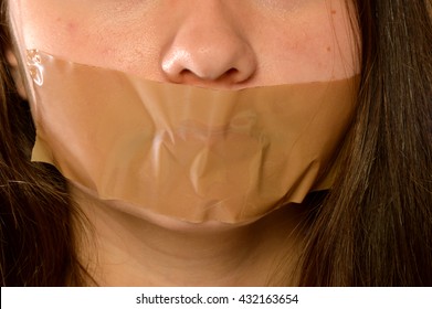 Picture of a woman reduced to silence - Shutterstock ID 432163654