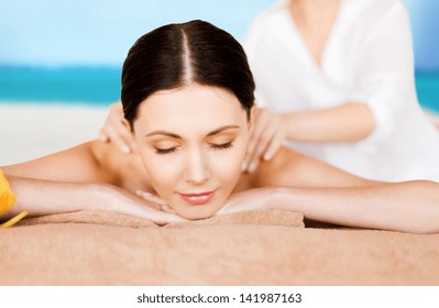 Picture Of Woman In Spa Salon Getting Massage On The Beach