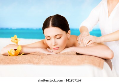 Picture Of Woman In Spa Salon Getting Massage On The Beach