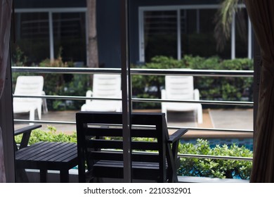 Picture Of A Wooden Chair By The Pool In A Hotel Room. Krabi In Thailand.Date 05 Oct 2022