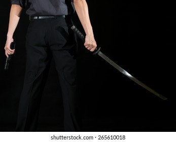 Picture Of Yakuza Holding Gun And Sword