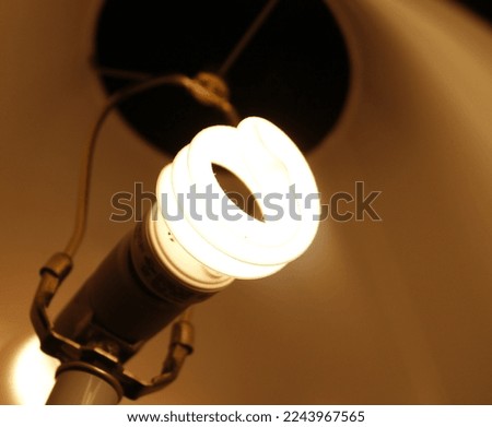 A picture of Yellow CFL Bulb