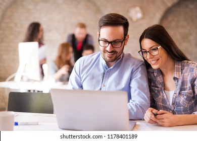 Picture of young architects discussing in office - Powered by Shutterstock