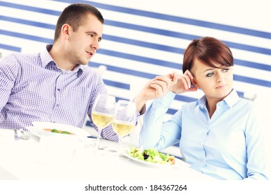 A Picture Of A Young Couple Having An Argument In A Restaurant