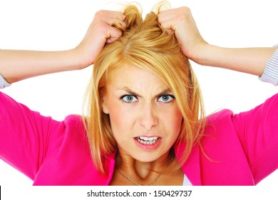 A picture of a young depressed woman tearing out her hair over white background
