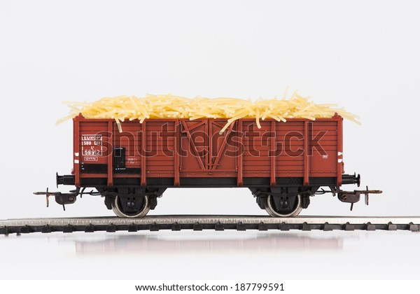 Pictured items of a toy\
railroad.
