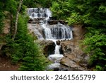 Pictured Rocks National Lakeshore is one of four national parks sites in Michigan’s Upper Peninsula, known for its stunning and colorful sandstone cliffs.