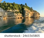 Pictured Rocks National Lakeshore is one of four national parks sites in Michigan’s Upper Peninsula, known for its stunning and colorful sandstone cliffs.