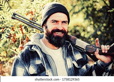 Pictures for Barbershop. Bearded hunter man holding gun and smile. Hunter with long beard on hunt. Barbershop vintage. Ideas about Barber shop and Barber salon
