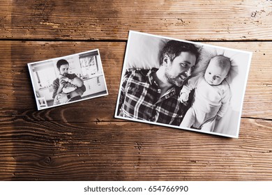 Pictures of father and baby, wooden background. Fathers day. - Shutterstock ID 654766990