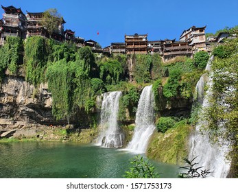 Picturesque ancient town in Hunan province in China - Hibiscus town and its spectacular Furong Waterfall.