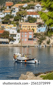Picturesque Assos town on Kefalonia island, Ionian sea, Greece. Greek summer resort Assos village in summer, Cephalonia island. Beautiful sea coast of Greece.
