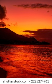 picturesque bright sunset on famous beach Beau Vallon in Seychelles, vertical background - Shutterstock ID 2225274761