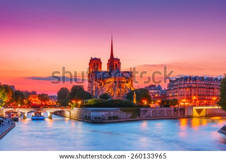 Picturesque cityscape of Cathedral of Notre Dame de Paris at sunset, France