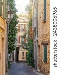 Picturesque cobbled street in the old town of Antibes on the French Riviera in the South of France