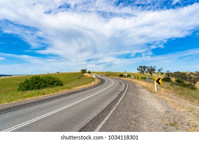 Picturesque Countryside Windy Rural Road With Spectacular Sky Above On Sunny Day. Travel, Adventure Background