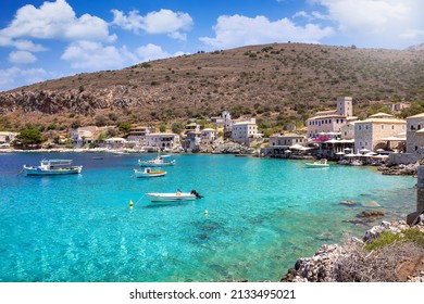 The picturesque fishing village of Limeni on the south Mani coast, Peloponnese, Greece, with turquoise sea during summer time - Shutterstock ID 2133495021