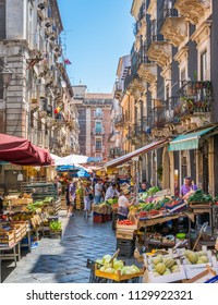 The Picturesque Food Market Of Catania On A Sunny Summer Day. Sicily, Southern Italy. July-01-2018