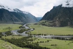 Picturesque Green River Valley. Summertime Natural Landscape, Mountains In The Clouds, Best Recreation Areas With Amazing View. Altai Republic, Siberia, Russia.