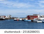 The picturesque harbour of Glace Bay, Cape Breton with many fishing boats.