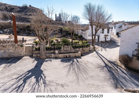 Picturesque houses with whitewashed facades and narrow streets in the village of Olmeda de las Fuentes, Madrid.