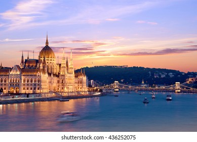 The picturesque landscape of the Parliament and the bridge over the Danube in Budapest, Hungary, Europe at sunset - Powered by Shutterstock