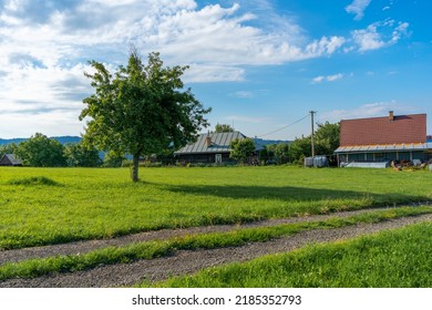 Picturesque Landscape Scenery On Abandoned Place, Traditional Slovak Village, Countryside, Blue Sky With Clouds, No People, Dirt Road, Green Grass, Slovakia, Europe