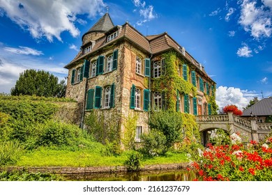 Picturesque mansion on a clear summer day. Summer mansion garden landscape. Mansion garden in summer. Beautiful mansion in summer