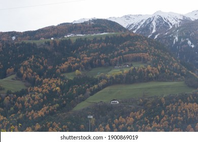 Picturesque Mountain Landscape In Naturns In South Tirol In Autumn, In The Background The Snow-covered Mountains, Blue Sky With Clouds, No People