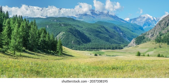 Picturesque mountain valley on a sunny summer morning, panoramic view - Powered by Shutterstock