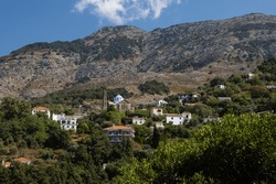 Picturesque Mountain Village Arethousa With Saint Marina Church On Ikaria Island In Greece.