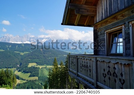 Similar – Foto Bild Young woman on the balcony who enjoys the view of the mountains