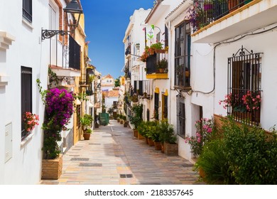 A Picturesque Narrow Street In Marbella Old Town, Province Of Malaga, Spain.