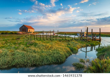 The picturesque old harbour and salt marshes at Thornham on the north coast of Norfolk