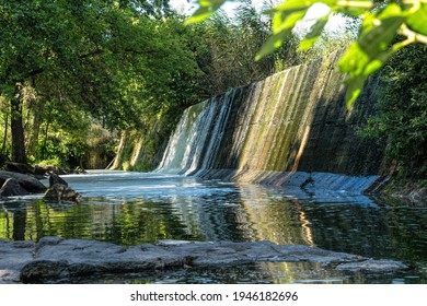 Picturesque Old Stone Dam Of An Abandoned Hydroelectric Power Station On The Mountain Tikich River In Buky Village, Ukraine. Picturesque Rural Landscape And Fresh Stream Of Running Stormy Water