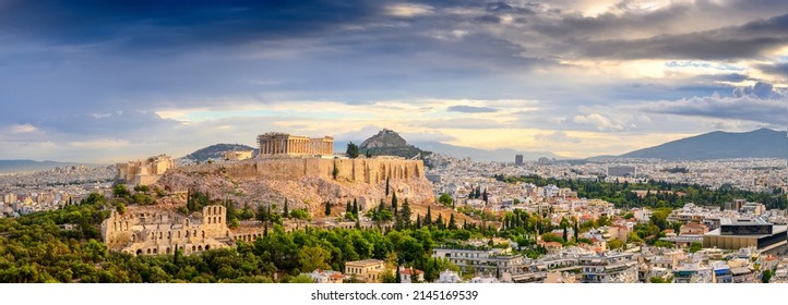 Picturesque Panorama of Athens with Acropolis hill at sunset, Athens, Greece. The Old Acropolis is the main attraction of Athens. - Shutterstock ID 2145169539