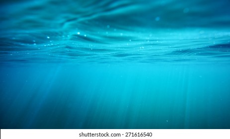 Picturesque panoramic underwater view. Sunbeams in turquoise water. Abstract natural texture, pattern, background, wallpaper, graphic resource. Sea, river, lake, pure nature, environment - Shutterstock ID 271616540