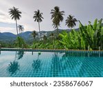 Picturesque pool in a cottage on a mountainside with a beautiful view of the mountainous tropical area