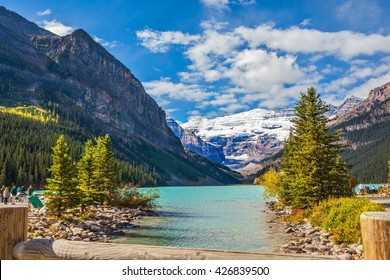 The picturesque promenade at Lake Louise. The lake is surrounded by mountains, glaciers and pine forests. Banff National Park, Rocky Mountains, Canada
