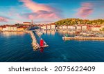 Picturesque summer sunset on Slovenia’s Adriatic coast with beautiful Venetian architecture. Amazing morning cityscape of Piran town. View from flying drone of old port.