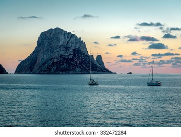 Picturesque sunset over mysterious island of Es Vedra. Ibiza, Balearic Islands. Spain