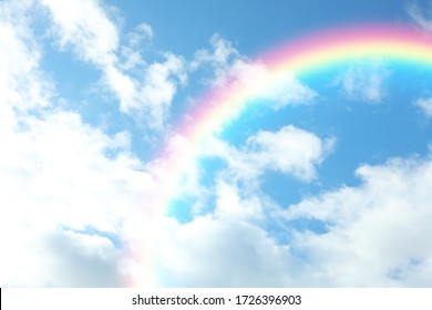 Picturesque View Of Beautiful Rainbow And Blue Sky On Sunny Day 