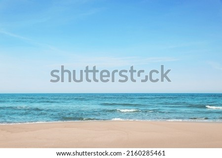 Picturesque view of beautiful sea and sandy beach on sunny day
